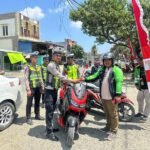Polres Mateng Bagikan Bendera Merah Putih, Kobarkan Semangat Nasionalisme Menjelang HUT RI ke-81